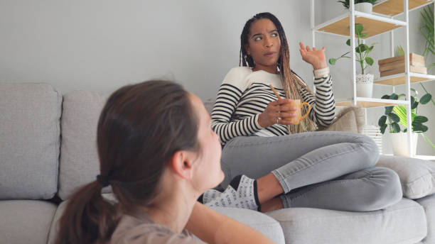 istock Roommates life.Two women relaxing at home. 1693667102