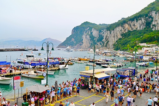 Capri Town, Italy: 09/20/2023- Picturesque Capri is an island in Italy in the Bay of Naples. Famous for rugged landscape, hotels, shopping, and beautiful villas.