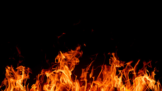 Red And Yellow Flames Burning In The Dark - Abstract Defocused Background