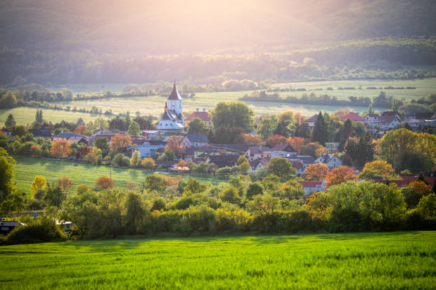 istock Spring Serenity: Evening Glow Over the Rural Landscape 1693697868