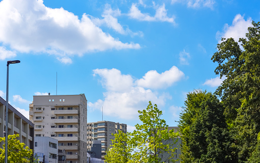 Housing complexes, blue sky background. Kanagawa Prefecture, Japan.