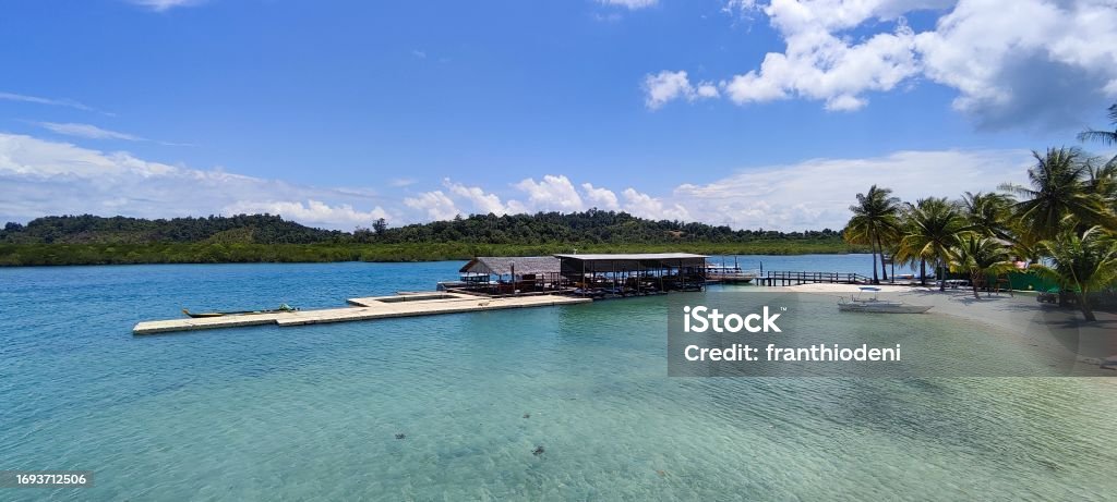 Blue water and blue sky in one frame of fav island destination in batam Beach Stock Photo