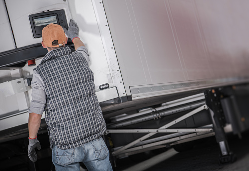 Semi Truck Refrigerated Semitrailer Cargo Temperature Check Performed by Trucker