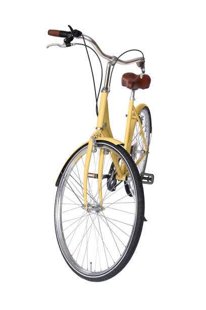 istock Yellow retro bicycle with brown saddle and handles, generic bike front view 1693718892