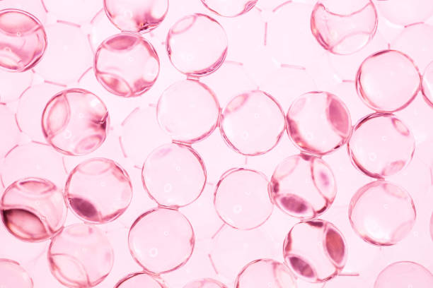 istock Pink copper salmon red cosmetic ingredient molecular textured background 1693726220