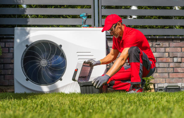 Professional Heat Pumps Technician Installing New Device stock photo