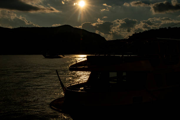 Boats at sunset on Lake Como at Como, Italy