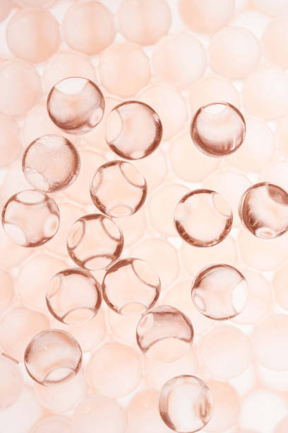 istock Pink copper salmon red cosmetic ingredient molecular textured background 1693731899