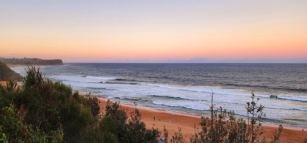 Beautiful sunset in the sandy shores of Mona Vale,  New South Wales, Australia
