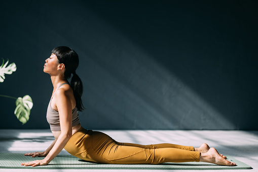 Meditation in motion with a Japanese woman (copy space).