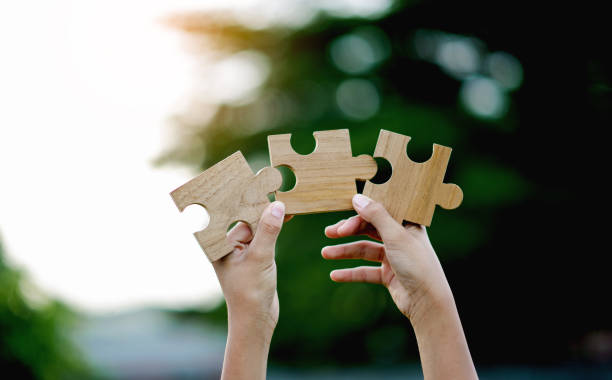 istock Jigsaw Puzzle Pieces Important Components Good work energy, connection, communication. and perfection, teamwork concept 1693753702