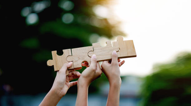 istock Jigsaw Puzzle Pieces Important Components Good work energy, connection, communication. and perfection, teamwork concept 1693753711