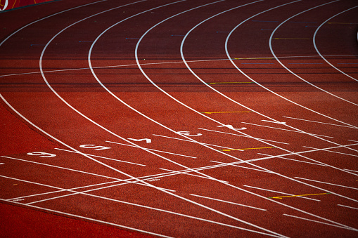 Red Track with Precise White Lines and Sequential Numbers: A Visual Representation of Athletic Preparation and Precision - Track and Field Illustration Photo for Worlds in Budapest and Games in Paris