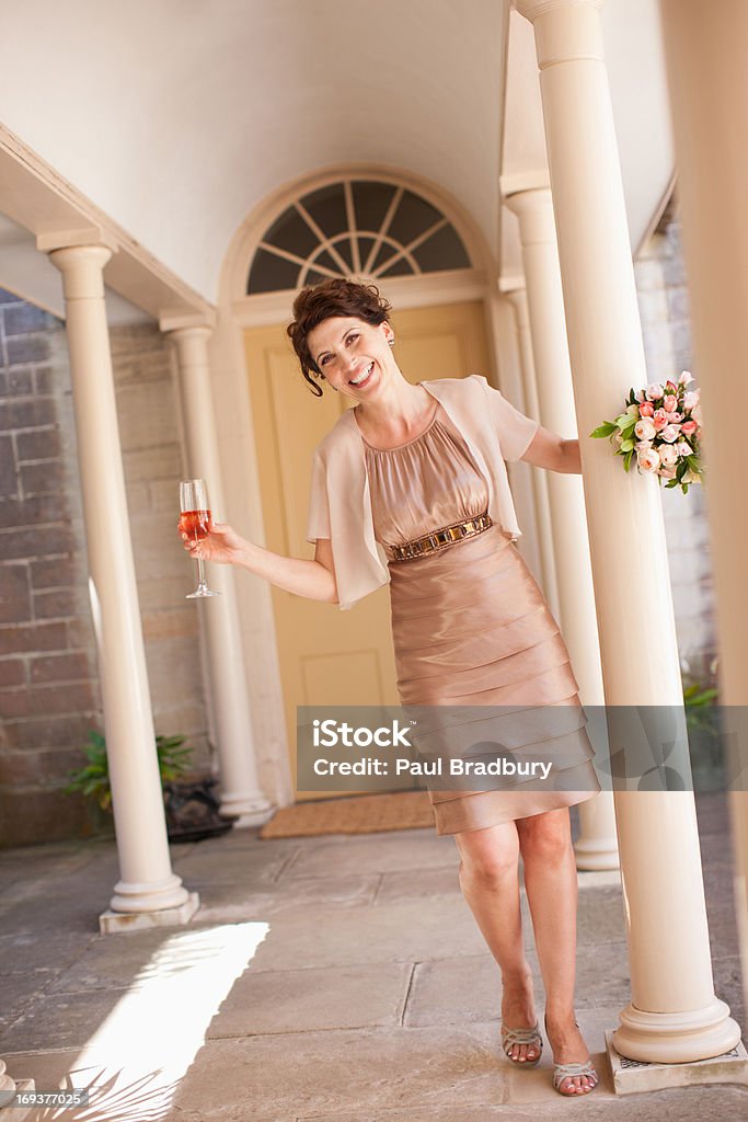 Mature bride holding bouquet  Bridesmaid Stock Photo