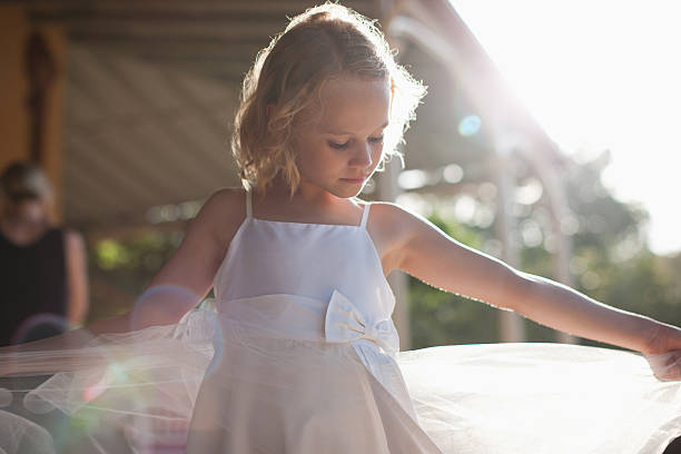 Flower girl with arms outstretched  flower girl stock pictures, royalty-free photos & images