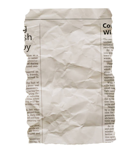 istock Wrinkled newspaper clipping with blank space for your copy 1693796340