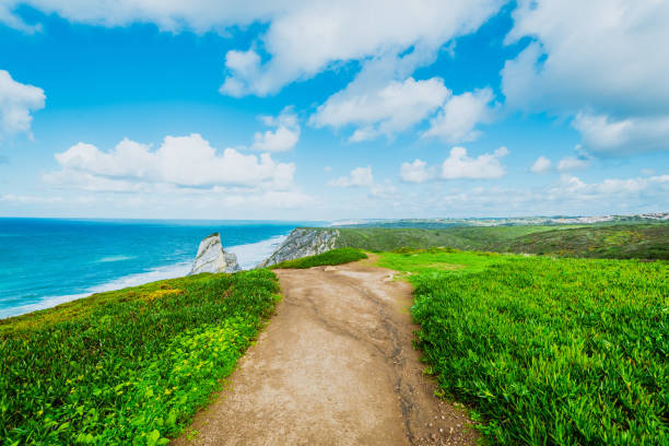 istock Tracking path among picturesque knolls leading 1693801886