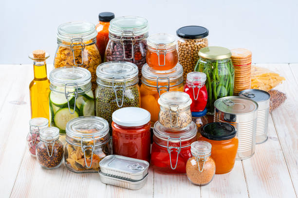 istock Preserved food in glass jars. High angle view 1693802518