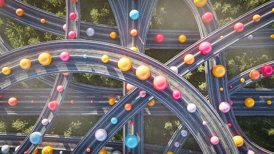 Colorful spheres on busy highway intersection, traffic simulation 3D render