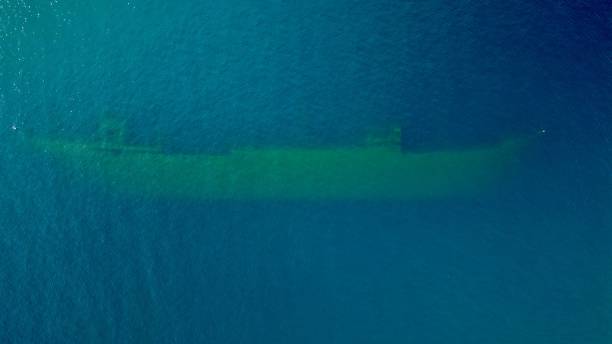 istock Sunken Ship Wreck in Saranda, Albania. Top Down Aerial View 1693834634