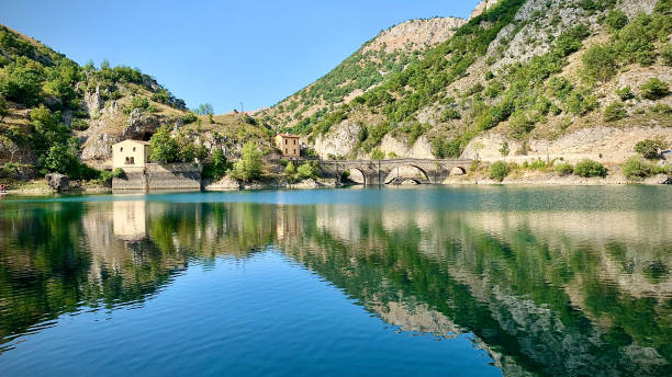 istock A Beautiful Day At The lake Surrounded By Mountains 1693853774