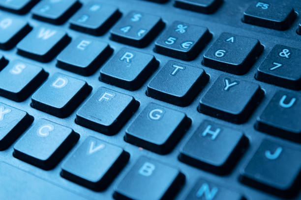 istock Closeup of keyboard cover with blue light 1693858744