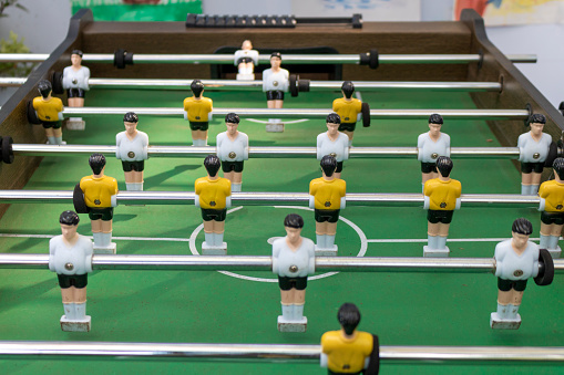 Table football game with players, close up of table football soccer game