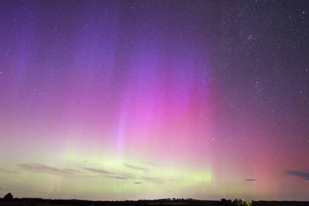 istock Northern lights aurora borealis in a night sky over a landscape 1693907010