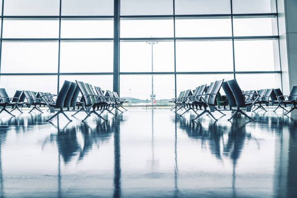 istock Benches in airport departure hall 1693917983
