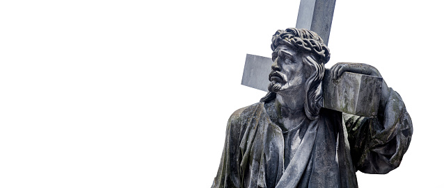 Jesus Christ statue antique against a white background isolated