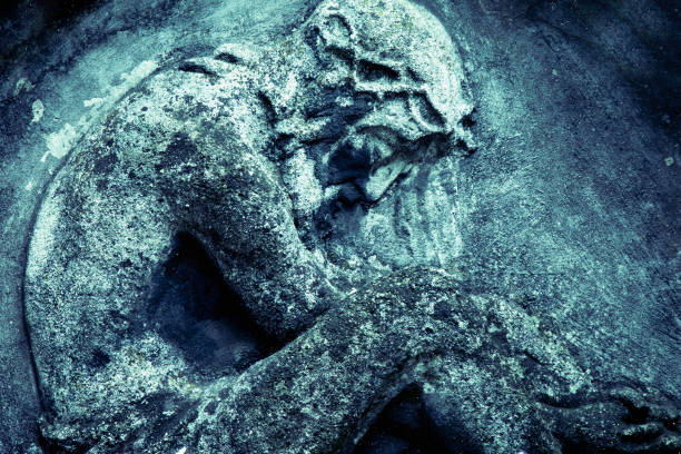 istock Jesus Christ statue against a background of gray stone 1693926838