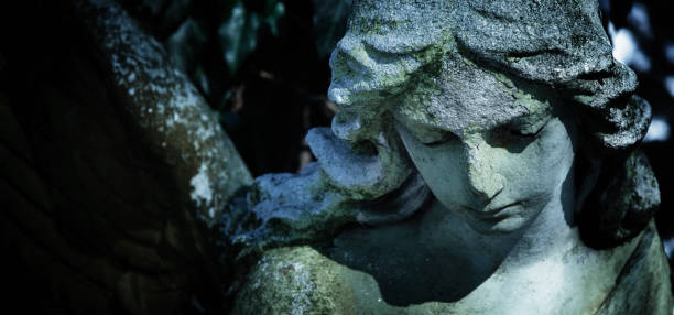 istock Death. Angel. Ancient sculpture. (pain, fear, future, the end concept) 1693927434