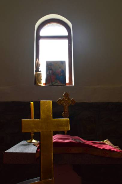 istock window and crosses in the church 1694045957