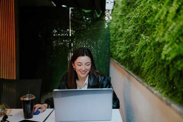 istock beautiful businesswoman working with remote working model 1694047086