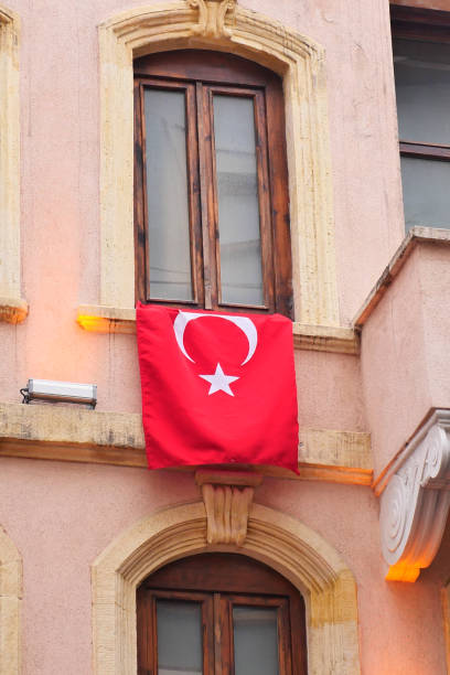 istock Turkish flag hanging on the window 1694087411