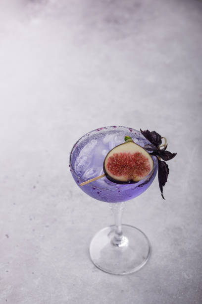 istock Purple fig cocktail or mocktail in glass 1694109503