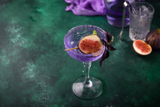 istock Purple fig cocktail or mocktail in glass 1694109505