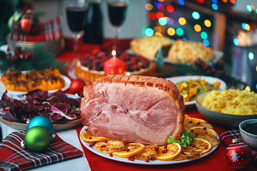 Christmas Dinner with Baked Glazed Ham with Mashed Potatoes, Green Beans, Radicchio Salad and Berry Pie