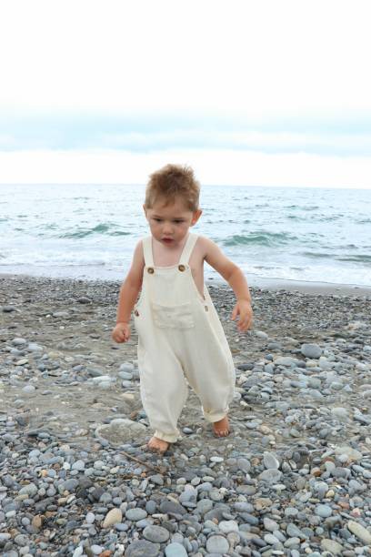 istock baby on the beach 1694112298