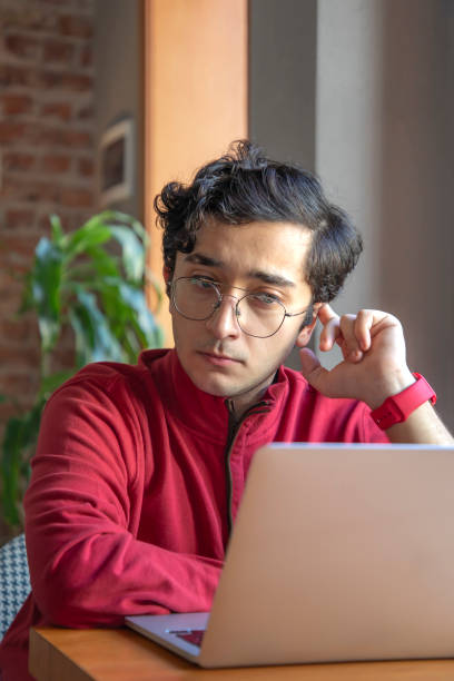 istock Young man worried while shopping on laptop 1694126344