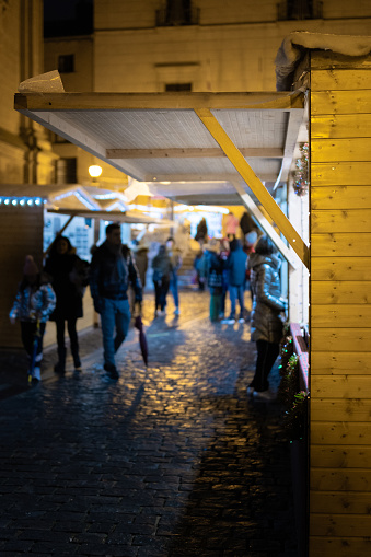 Christmas stall in Tudela at night. It is cold and crowded. Navarra, Spain.