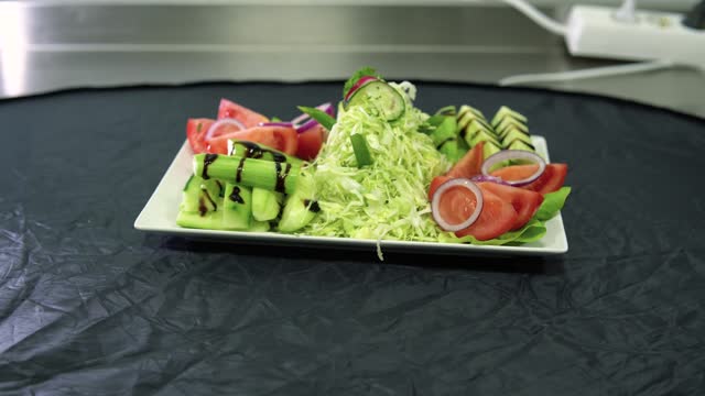 Salad of arugula, cheese, tomato and olives stock video