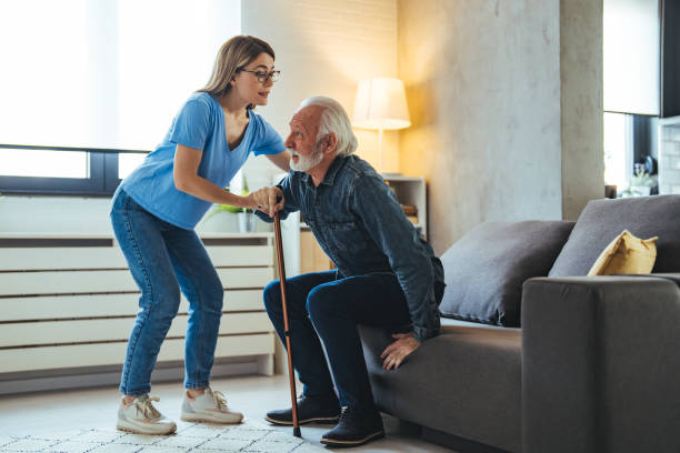 istock Caring nurse with senior man 1694166425