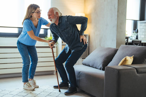 istock Caring nurse with senior man 1694166433