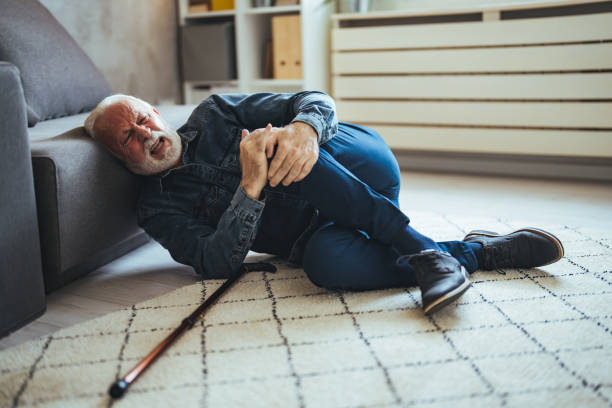 istock Senior Man Fallen On Carpet With Walking Stick 1694168053