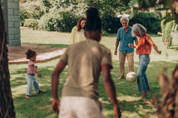 istock happy multi ethnic family play outside together 1694187467