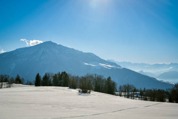 istock Beautiful view on snowy Mount Rigi from Zugerberg 1694191844