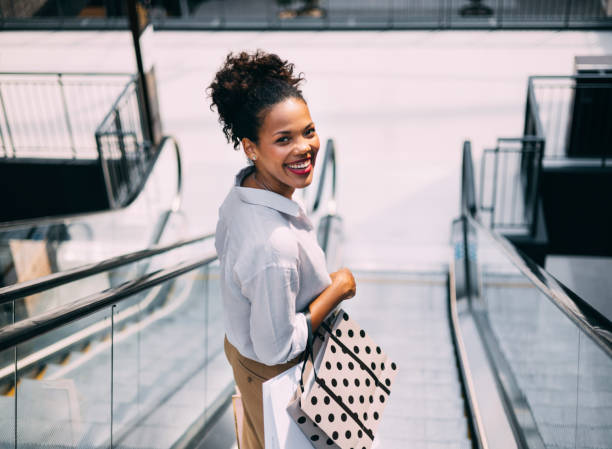 istock A Happy Beautiful Cuban Woman Looking At Camera While Going Shopping 1694193555