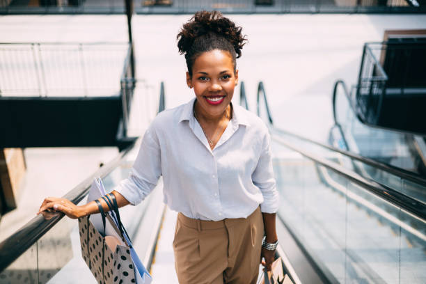 istock A Happy Beautiful Cuban Woman Looking At Camera While Going Shopping 1694197094