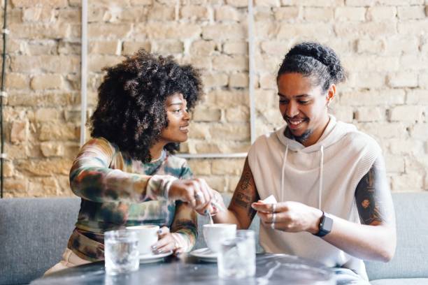 istock Man and woman having a coffee in the cafe 1694214400